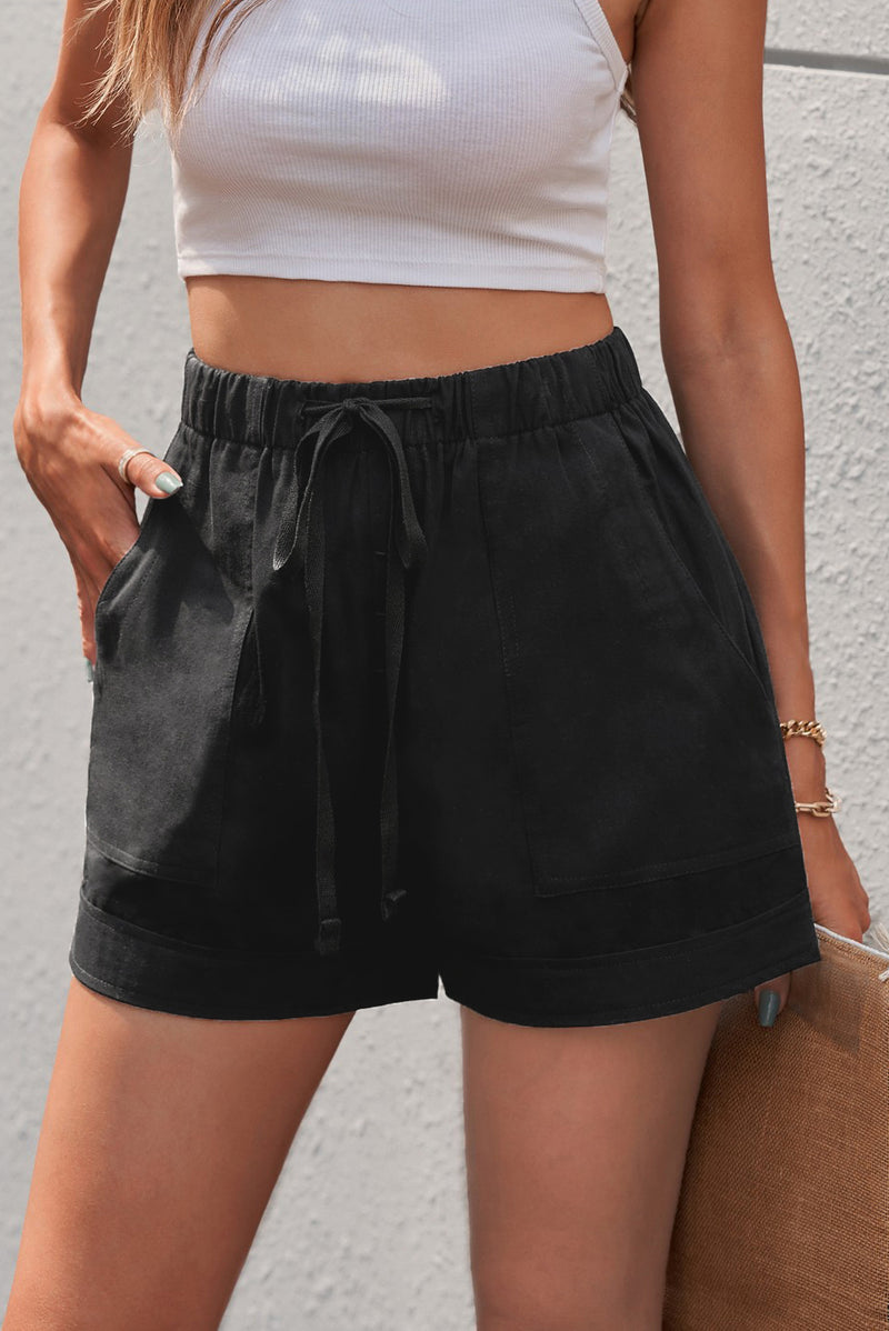 Short avec poche à taille élastique et cordon de serrage