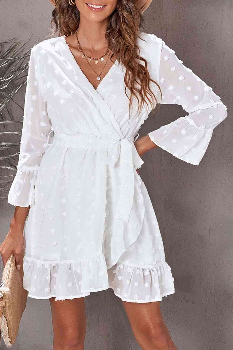 Robe surplis à volants et à taille nouée à pois suisses