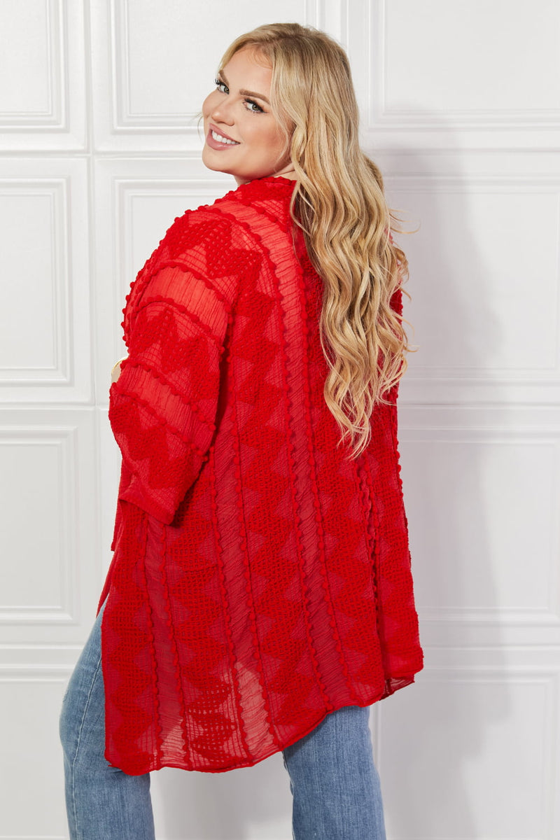 Cardigan poncho asymétrique à pompons Justin Taylor en rouge